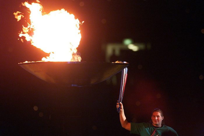 18 Oct 2000: Louise Sauvage of Australia lights the cauldron during the opening of the Sydney 2000 Paralympic Games at Sydney Olympic Park, Sydney Australia. DIGITAL IMAGE. Mandatory Credit: Jamie Squire/ALLSPORT