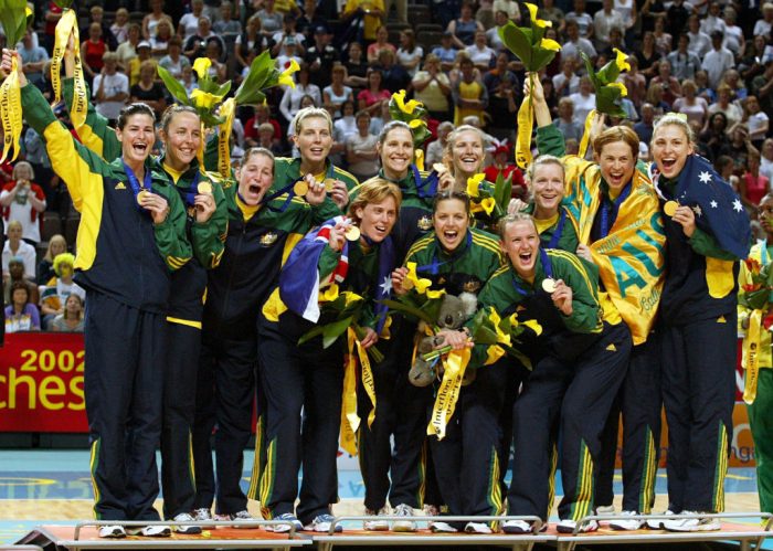 NEW ZEALAND - AUGUST 14: The Australian Netball team celebrate with their gold medals after the Netball final between New Zealand and Australia played at the MEN Arena, during the XVII Commonwealth Games, Sunday. Australia won 5557 to win gold in extra time. (Photo by Michael Bradley/Getty Images)