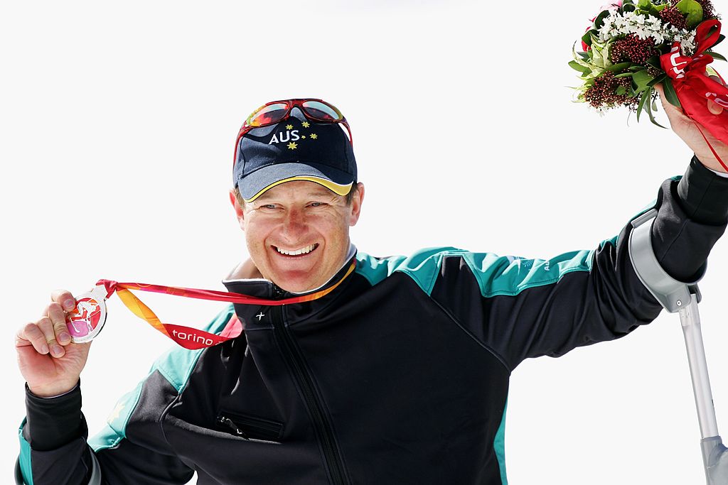 TURIN, ITALY - MARCH 11: Michael Milton of Australia celebrates taking the silver medal during the Standing Men's Downhill Skiiing Competiton on day one of the 2006 Turin Winter Paralympic Games on March 11, 2006 in Sestriere Borgata, Italy. (Photo by Bryn Lennon/Getty Images)